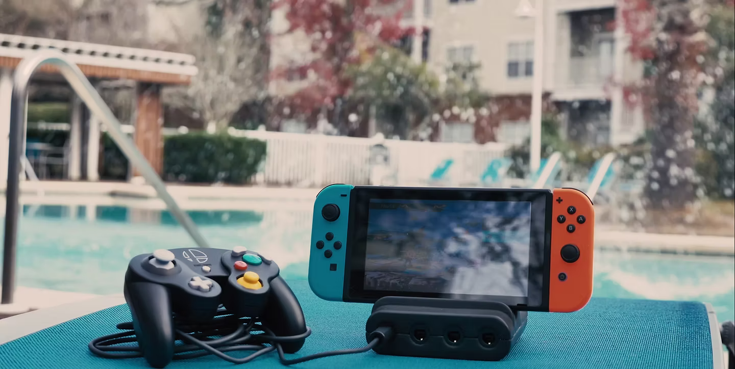 Ultimate GameCube Adapter by a pool.